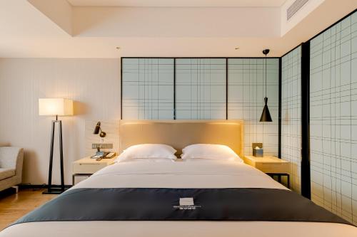 Imagen de la habitación del Hotel Echarm Mianyang High-speed Railway Station CapitaLand Plaza. Foto 17