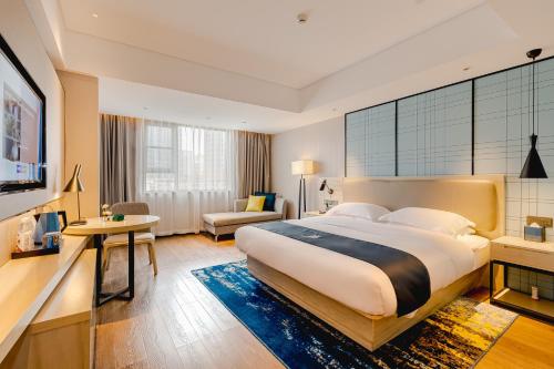 Imagen general del Hotel Echarm Mianyang High-speed Railway Station CapitaLand Plaza. Foto 11