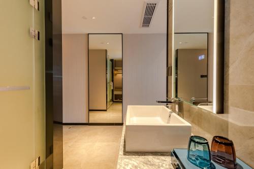 Imagen general del Hotel Echarm Mianyang High-speed Railway Station CapitaLand Plaza. Foto 12