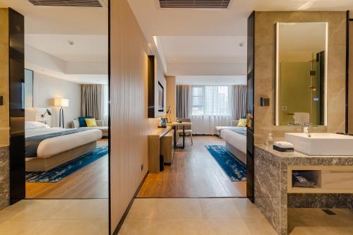 Imagen general del Hotel Echarm Mianyang High-speed Railway Station CapitaLand Plaza. Foto 13