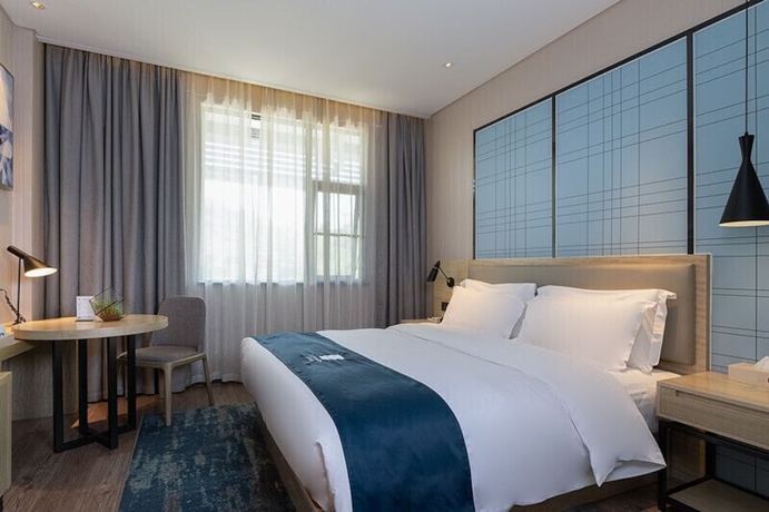 Imagen de la habitación del Hotel Echarm Nanning Qingxiushan. Foto 6