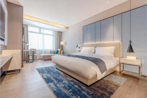 Imagen general del Hotel Echarm Nanning Wuxiang Headquarters Base. Foto 2