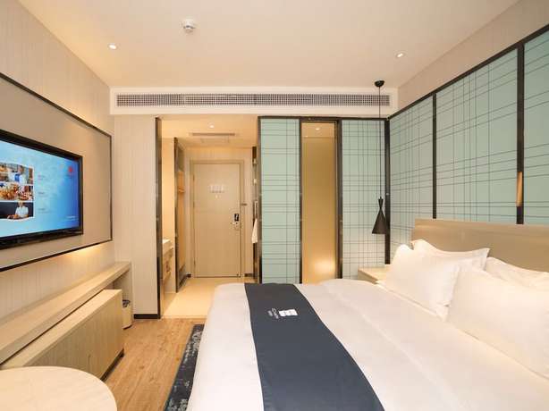 Imagen de la habitación del Hotel Echarm Pazhou Convention and Exhibition Center Branch. Foto 7