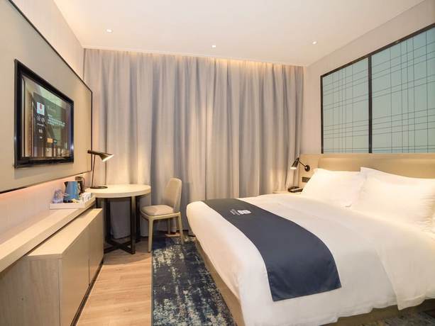 Imagen de la habitación del Hotel Echarm Pazhou Convention and Exhibition Center Branch. Foto 11