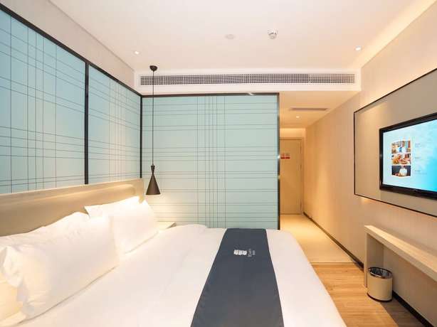 Imagen de la habitación del Hotel Echarm Pazhou Convention and Exhibition Center Branch. Foto 13