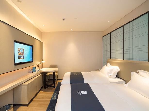 Imagen de la habitación del Hotel Echarm Pazhou Convention and Exhibition Center Branch. Foto 15
