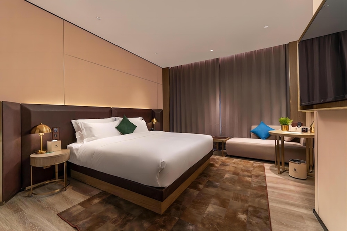 Imagen de la habitación del Hotel Echarm Plus Smart New City Branch. Foto 6