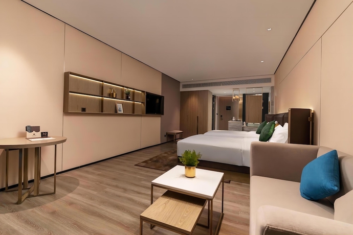 Imagen de la habitación del Hotel Echarm Plus Smart New City Branch. Foto 10