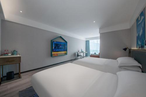 Imagen general del Hotel Echarm Potala Palace Da Zhao Temple Branch. Foto 2