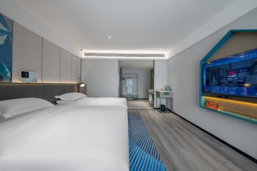 Imagen general del Hotel Echarm Potala Palace Da Zhao Temple Branch. Foto 3