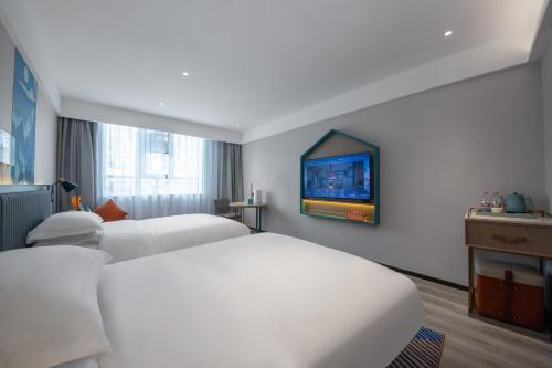 Imagen general del Hotel Echarm Potala Palace Da Zhao Temple Branch. Foto 4