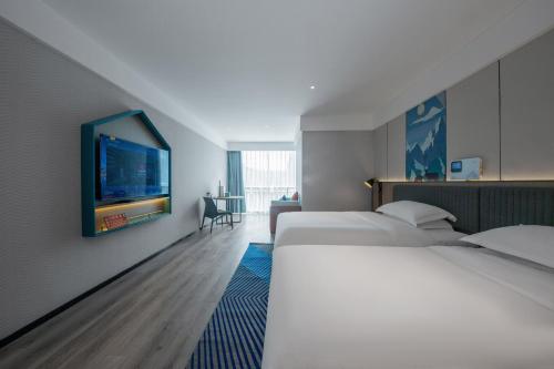 Imagen general del Hotel Echarm Potala Palace Da Zhao Temple Branch. Foto 7