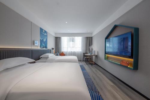 Imagen general del Hotel Echarm Potala Palace Da Zhao Temple Branch. Foto 8