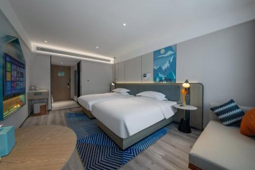 Imagen de la habitación del Hotel Echarm Potala Palace Da Zhao Temple Branch. Foto 19