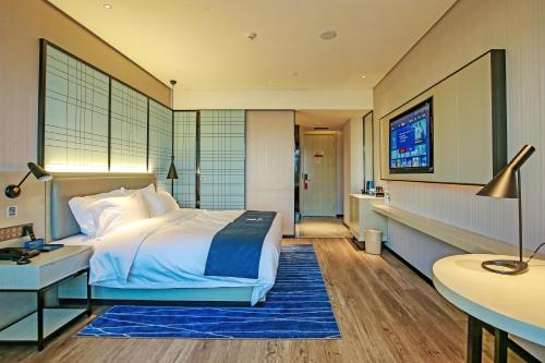 Imagen general del Hotel Echarm Pubei Chengxin Commercial Plaza. Foto 6