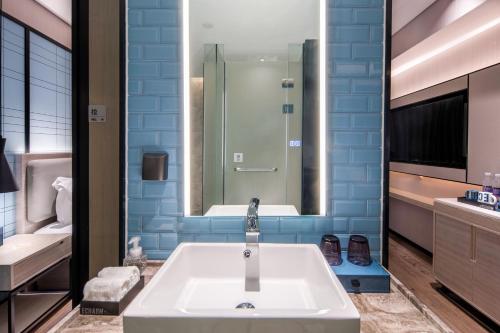 Imagen de la habitación del Hotel Echarm Pubei Chengxin Commercial Plaza. Foto 20