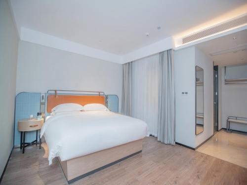 Imagen general del Hotel Echarm Qingyuan Qingcheng Station Municipal Government Shop. Foto 3