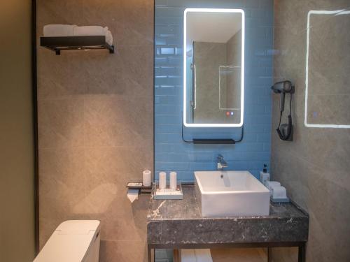 Imagen general del Hotel Echarm Qingyuan Qingcheng Station Municipal Government Shop. Foto 5