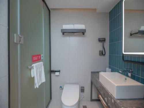 Imagen general del Hotel Echarm Qingyuan Qingcheng Station Municipal Government Shop. Foto 6