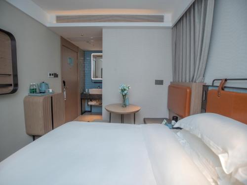 Imagen general del Hotel Echarm Qingyuan Qingcheng Station Municipal Government Shop. Foto 10