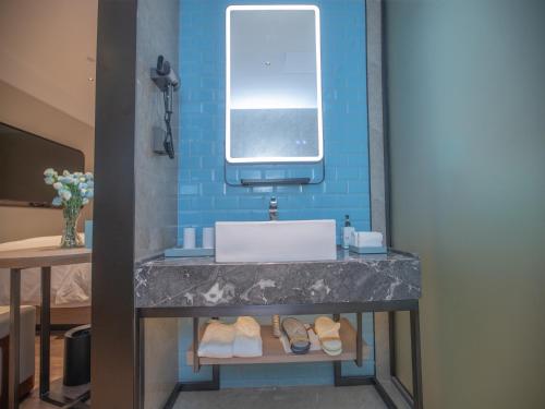 Imagen general del Hotel Echarm Qingyuan Qingcheng Station Municipal Government Shop. Foto 12