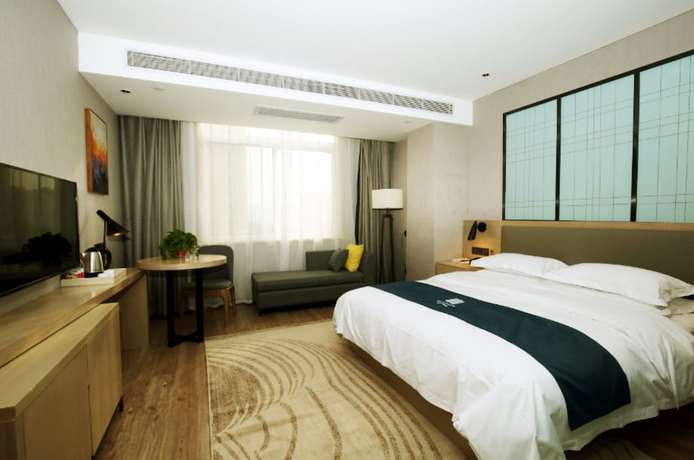 Imagen de la habitación del Hotel Echarm Qingyuan Stadium Branch. Foto 4