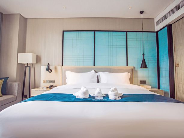 Imagen de la habitación del Hotel Echarm Qionghai Wanquanhe Branch. Foto 13