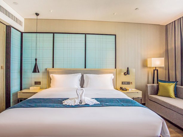 Imagen de la habitación del Hotel Echarm Qionghai Wanquanhe Branch. Foto 14