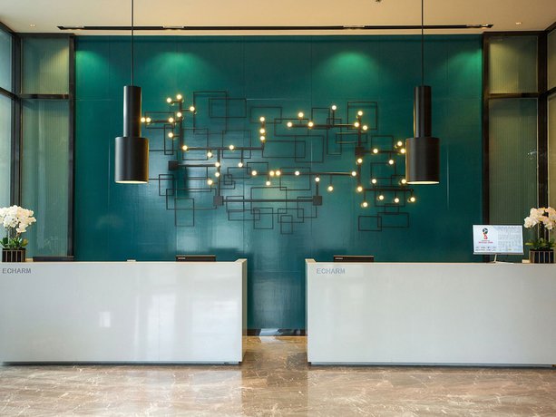 Imagen de los interiores del Hotel Echarm Qionghai Wanquanhe Branch. Foto 20