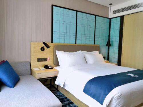 Imagen general del Hotel Echarm Tongshan Niutoushan Park. Foto 12