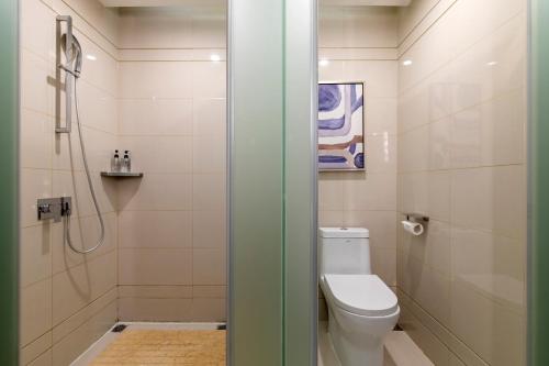 Imagen de la habitación del Hotel Echarm Wuhan Guanggu Biology City. Foto 11