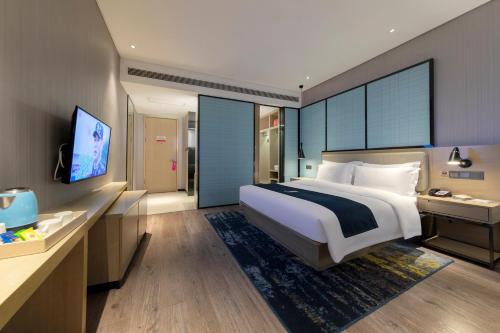 Imagen general del Hotel Echarm Wuhan Guanggu Biology City. Foto 4