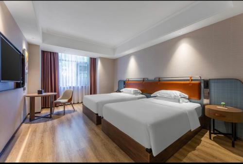 Imagen general del Hotel Echarm Wuhan Hanxi Third Road Branch. Foto 2
