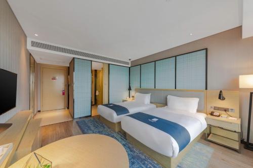 Imagen general del Hotel Echarm Wuhan Hanyang Wangjiawan Sixin Avenue Metro Station. Foto 9