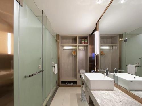 Imagen de la habitación del Hotel Echarm Wuhan Huangpu Erqi Xiaolu Metro Station. Foto 7