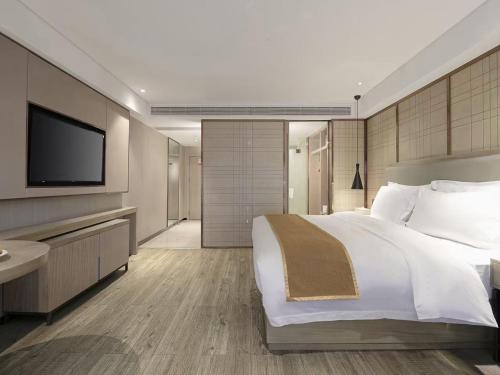 Imagen general del Hotel Echarm Wuhan Huangpu Erqi Xiaolu Metro Station. Foto 2