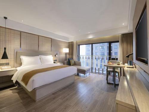 Imagen general del Hotel Echarm Wuhan Huangpu Erqi Xiaolu Metro Station. Foto 3