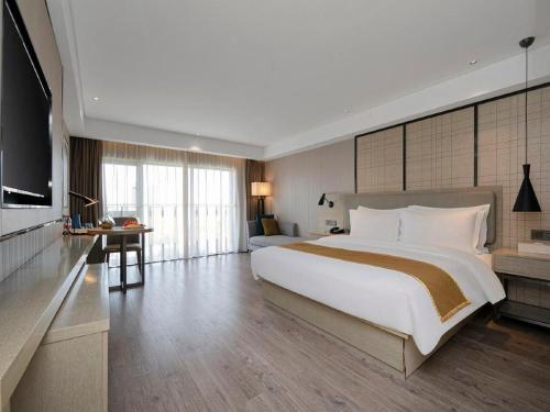 Imagen general del Hotel Echarm Wuhan Huangpu Erqi Xiaolu Metro Station. Foto 5