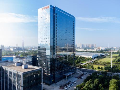 Imagen general del Hotel Echarm - Wuhan Jingkai Yongwang Sports Center. Foto 1