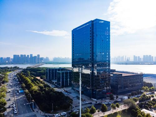 Imagen general del Hotel Echarm - Wuhan Jingkai Yongwang Sports Center. Foto 3