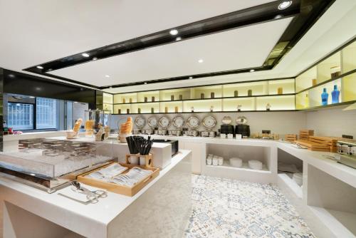 Imagen general del Hotel Echarm Wuzhou Canghai Lake High Speed Railway Station. Foto 4