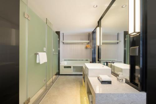 Imagen general del Hotel Echarm Wuzhou Canghai Lake High Speed Railway Station. Foto 15