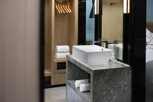 Imagen de la habitación del Hotel Echarm - Xi\'an West 2nd Ring Road Taio Plaza. Foto 14