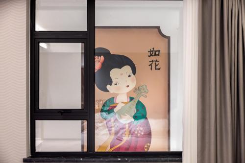Imagen general del Hotel Echarm - Xi\'an Zhonglou Hui Min Jie. Foto 17