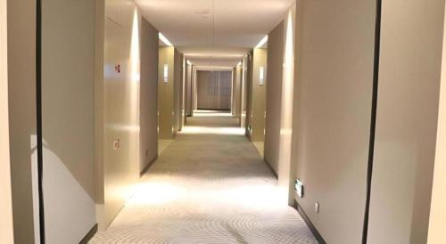 Imagen general del Hotel Echarm Yangzhou Jiangdu Jinyin Plaza. Foto 3