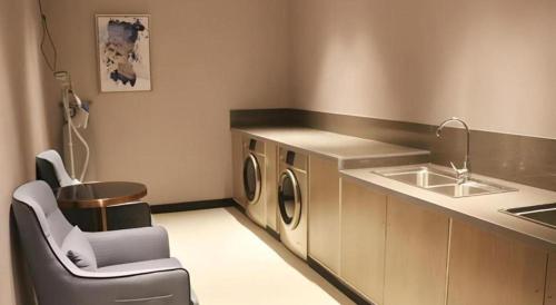 Imagen general del Hotel Echarm Yangzhou Jiangdu Jinyin Plaza. Foto 9