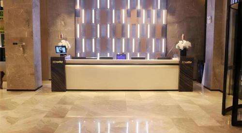 Imagen general del Hotel Echarm Yangzhou Jiangdu Jinyin Plaza. Foto 11