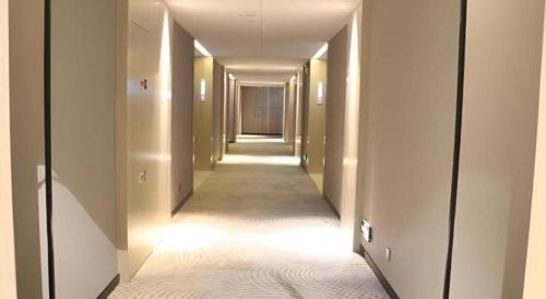 Imagen general del Hotel Echarm Yangzhou Jiangdu Jinyin Plaza. Foto 14