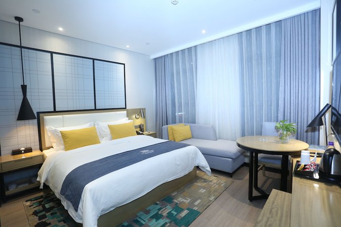 Imagen de la habitación del Hotel Echarm Zhengzhou High Tech Zone. Foto 8