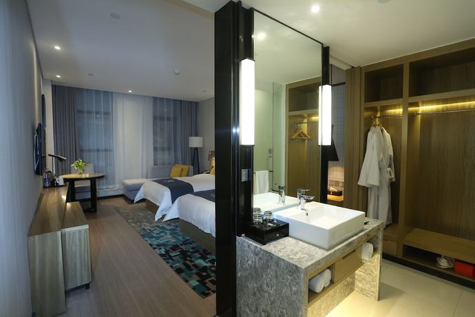 Imagen de la habitación del Hotel Echarm Zhengzhou High Tech Zone. Foto 13